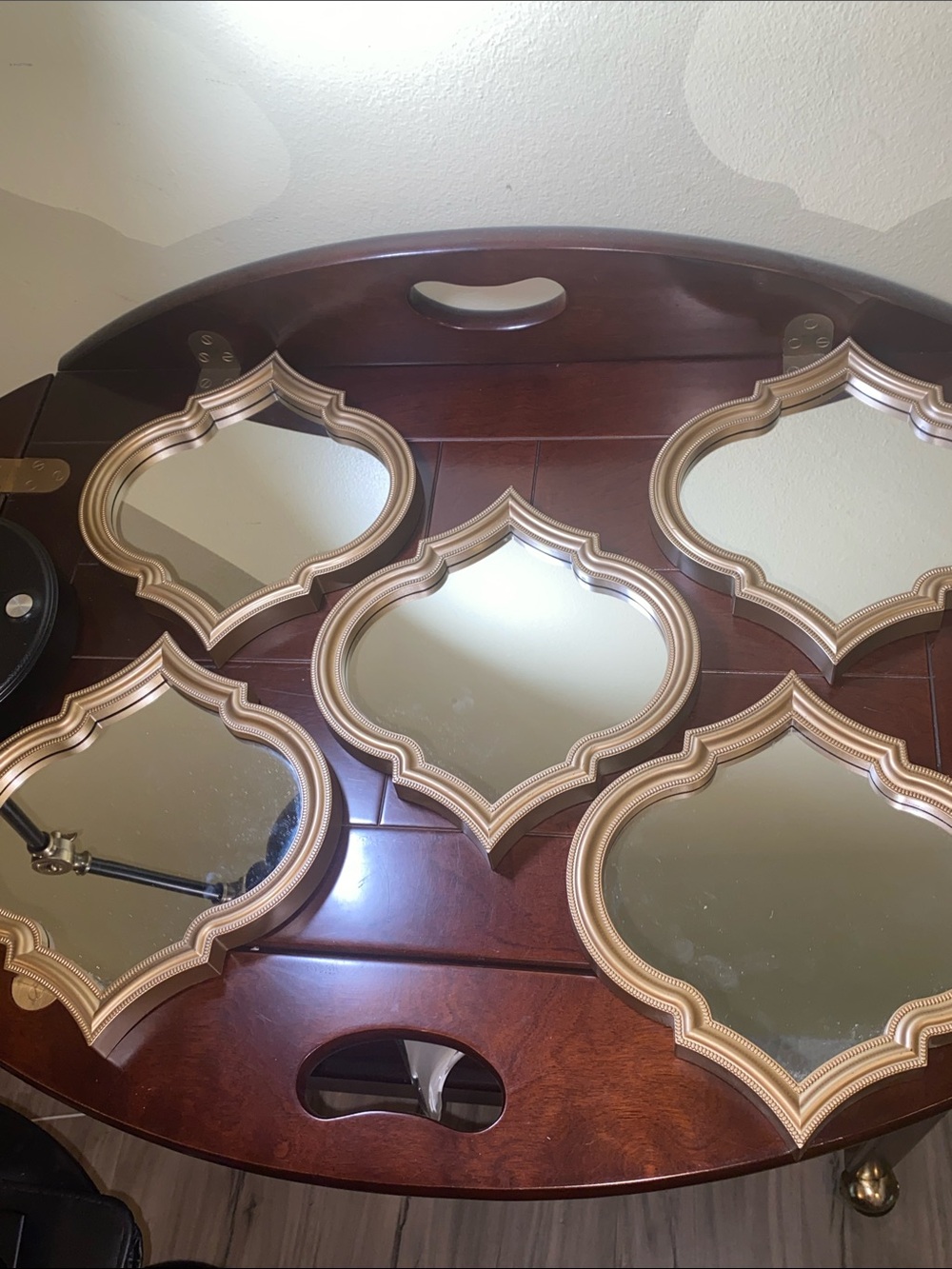 set of 5 accent wall mirrors featuring a champagne gold quatrefoil